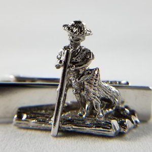 Silver tone man with collie dog on raft tie clip